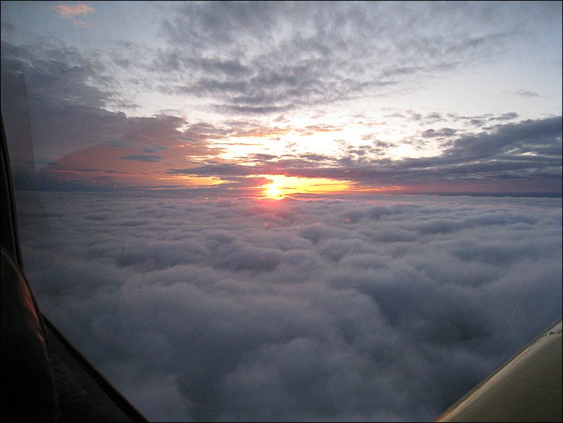 Above the cloud
        deck at sunset, somewhere west of Worcester